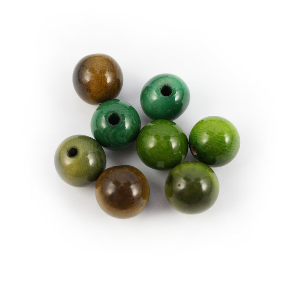 Runde und olivenförmige Taguaperlen